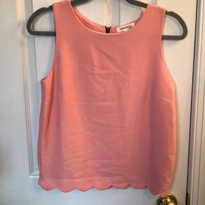 Light pink/coral scalloped top